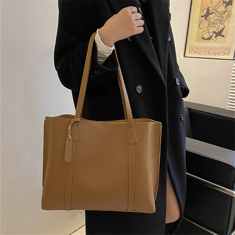 Classic Black Faux Leather Tot - огляд і ціна Leather Work Handbags